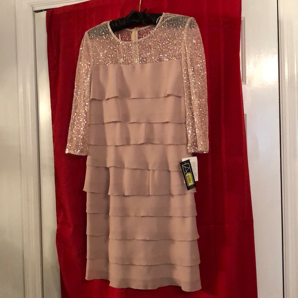 New with tags. Sequins on bodice.